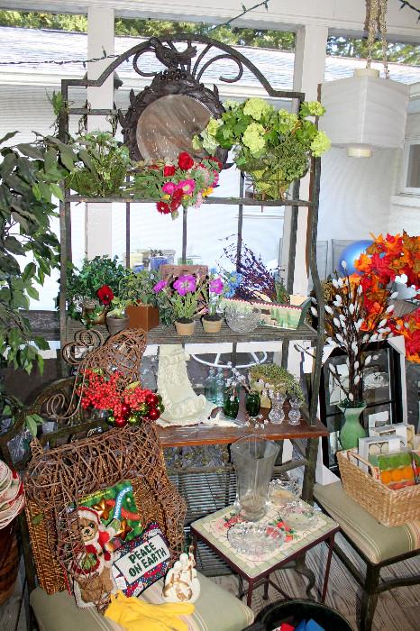 Iron baker's rack with faux plants and decor