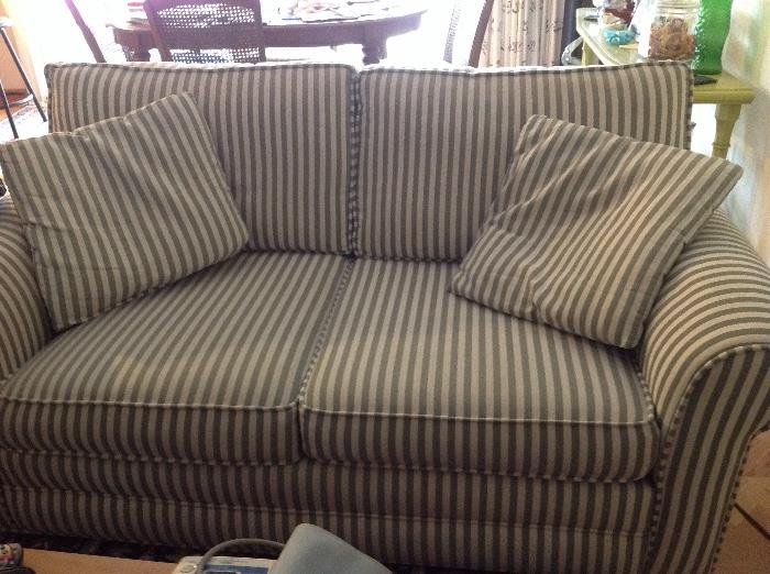 Blue and white striped couch. Matching couch and love seat good condition and very comfortable. 
