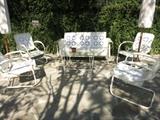 Set of 1930's Patio Furniture.  Rocking Loveseat and 2 Chairs are Original vintage; two are Restoration Reproductions; w/ a 1960's Retro Patio Coffee Table.