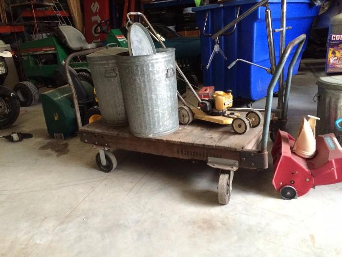 Industrial Wood and Cast Iron Cart---use to haul in your warehouse or re-make it into a coffee table or bar surface