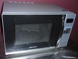 BRAND NEW MICROWAVE ,1100 WATT, NEVER USED- WITH MANUAL,STAINLESS STEEL-NICE