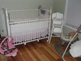 VIEW OF ROOM WITH BABY ACCESSORIES