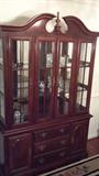 very nice condition china cabinet, mahogany, glass front and sides, glass shelves with plate slit, super nice