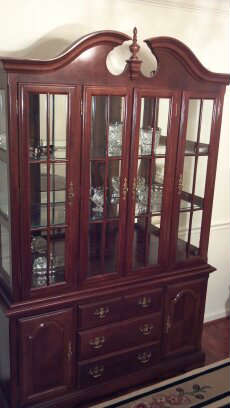very nice condition china cabinet, mahogany, glass front and sides, glass shelves with plate slit, super nice