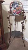 brass plant stand and oriental urn