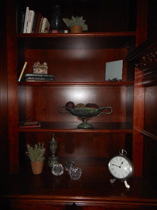bookshelf plants and clock