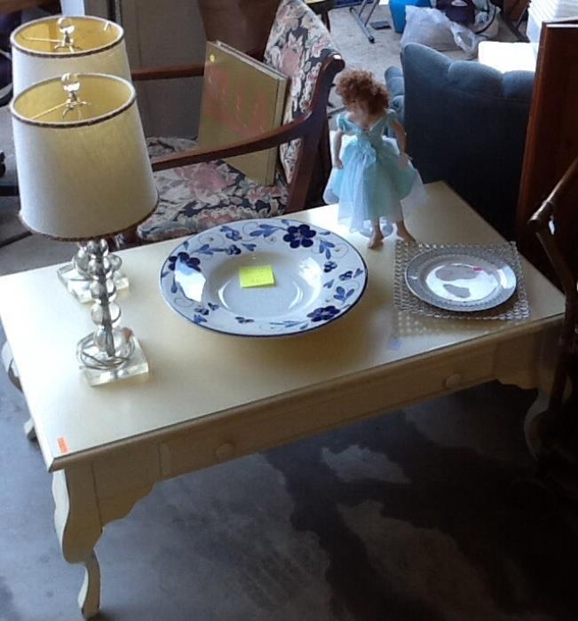 Cottage styled, oversized coffee table w/ drawer. 2 acrylic lamps, dancing doll,  lg blue design bowl.