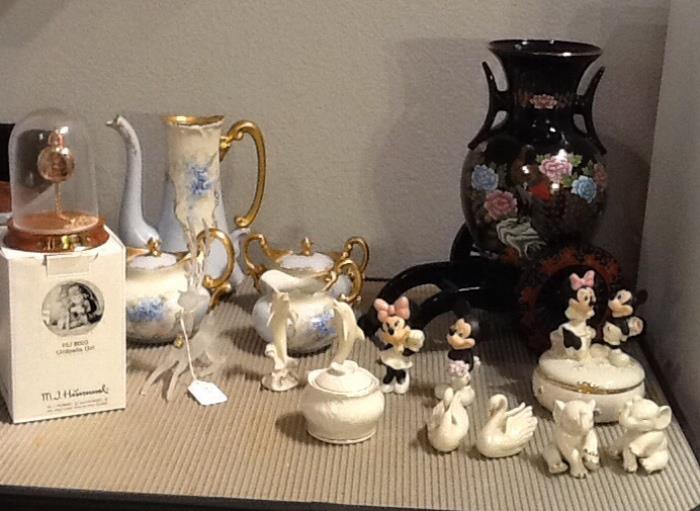 Lenox figurines, Lenox Disney figurines, hand painted chocolate pot, oriental vase sitting on pull cart.