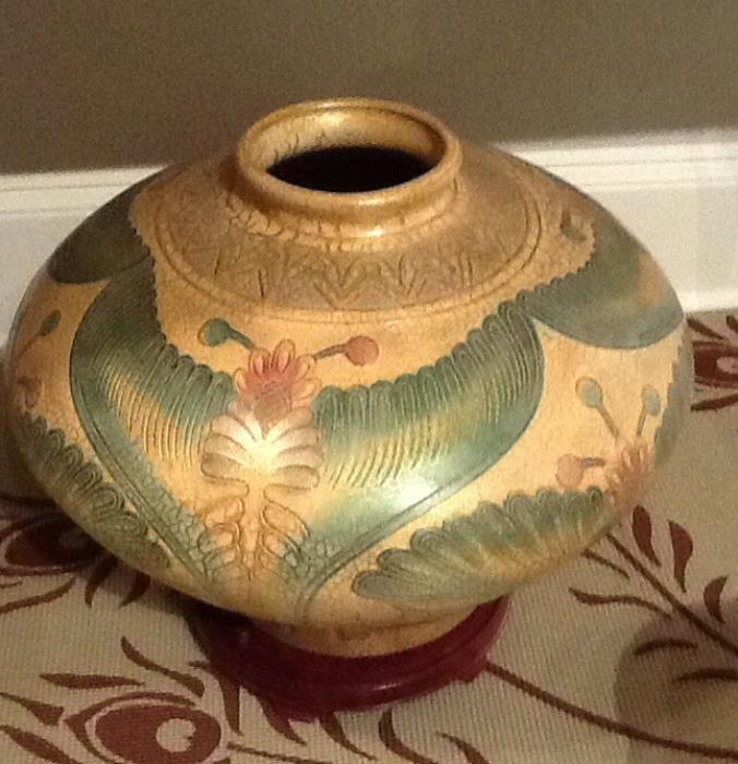 Hand decorated vase.