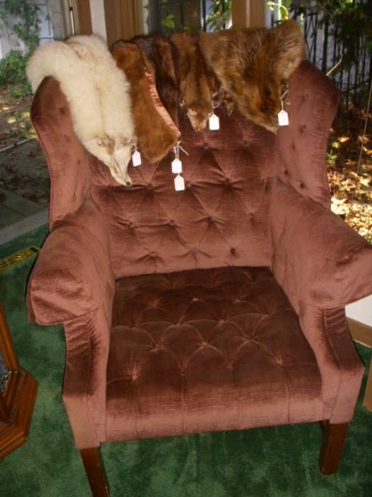 Chair displaying furs