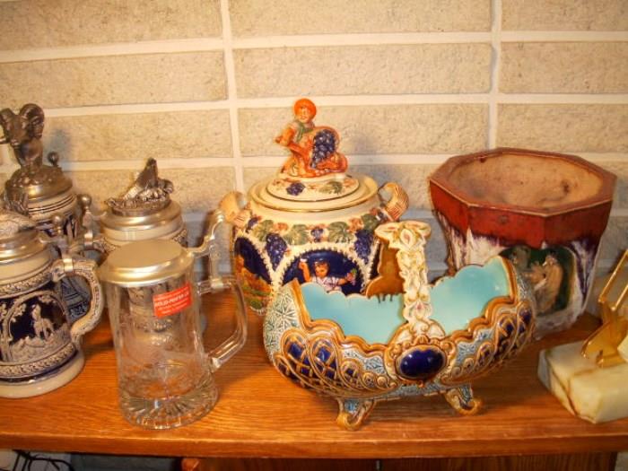Assortment of steins, Austrian majolica basket, and oriental jardiniere