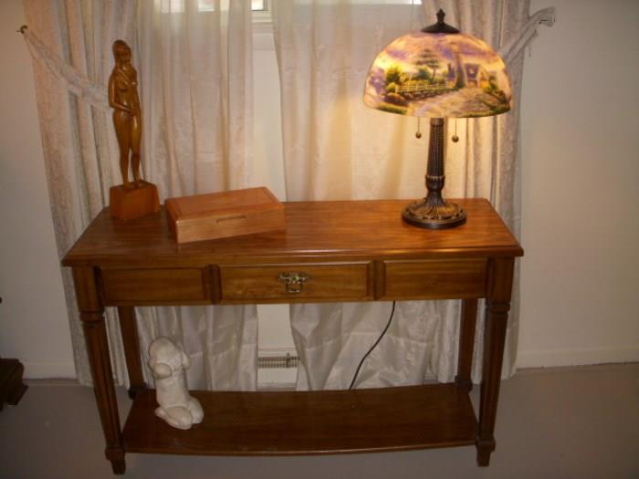 Table with newer reverse painted lamp with a lighthouse scene
