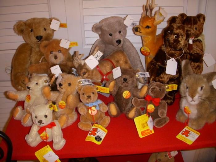 Steiff animals.  Two brown bears to back right are not Steiff, but are wind-up toys