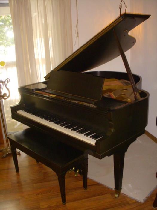 Grinnell Brothers mahogany grand piano and bench