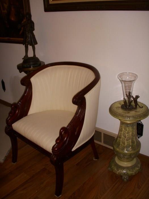 Carved swan chair, Pedestal is by Haynes Pottery, Baltimore, Md.  Signed on the bottom