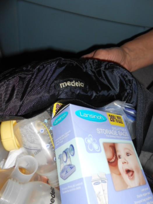 Medela Breast Pump with accessories and backpack
