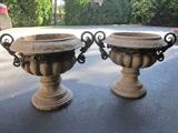 Two matching Planters.  Faux stone with Iron handles.  Have never been used outside only indoors. Like brand new.