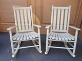 2 mossy green wooden rockers for outdoors.  Color is not correct in photo. They look much greener in person.