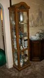Curio cabinet stuffed with smalls...