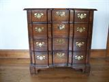 Century "Chippendale" style chest. 4 drawer w/brass eschuteons.