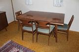 Mid Century Modern dining table and chairs. 2 arm & 4 side.