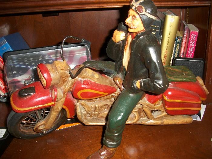 one of three motorcycle collectibles