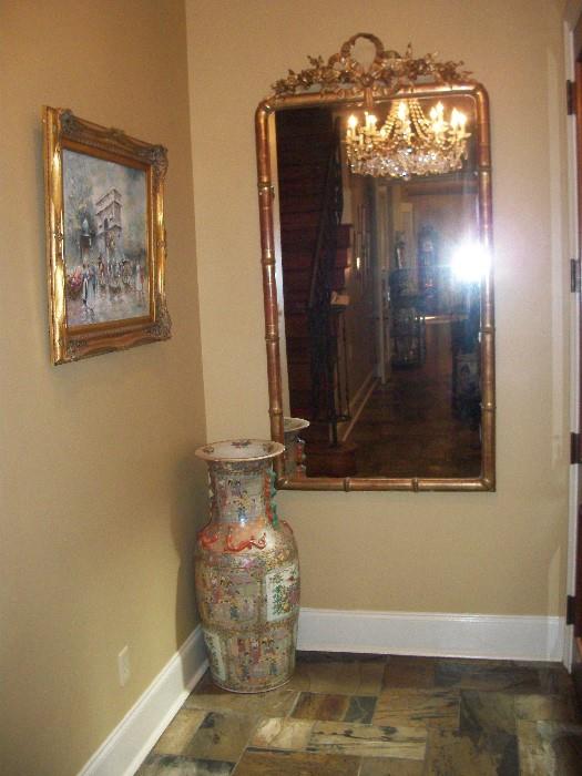 one of two large European gilded mirrors