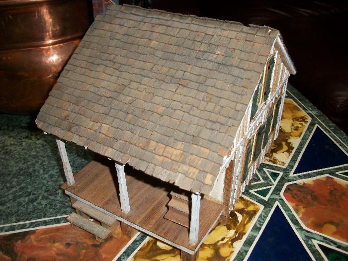 custom made old style handmade Cajun house by artist John LaBlanc