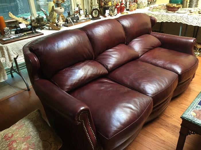 we have two high end designer leather sofas in almost new condition