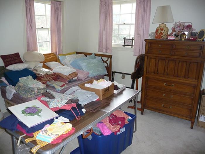 Linens, Dresser and Twin Bed