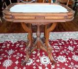 Eastlake Table With Marble Top And Ornate Wood Edge, Burled Accents And On Wood Casters, Missing Small Round Ornate Wood Trim Piece 30 .5"H X 28"W X 21"D