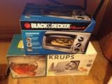 Toaster oven, meat slicer and punch bowl set.