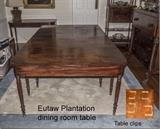 Full view of the plantation dining room table with extensions in place - seats 12.  Made of walnut.
