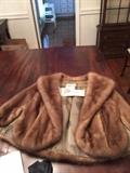 A beautiful mink cape with tags.  Excellent condition.