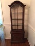 Very nice curio cabinet.