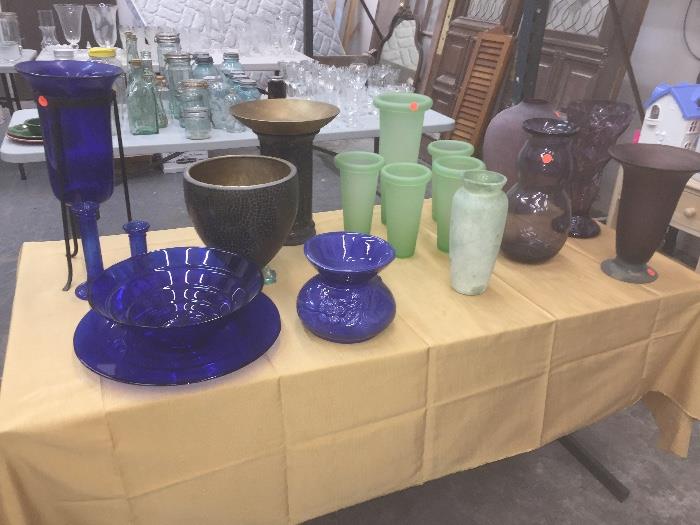 Misc vases, decorative bowls, plates, and glassware used for many purposes