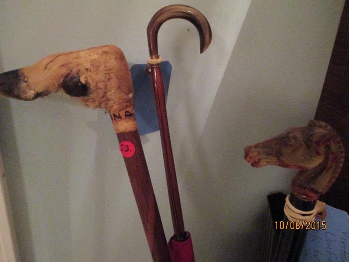 Hoof Cane and 2 Old Umbrellas, one with Bakelite or plastic horse head.