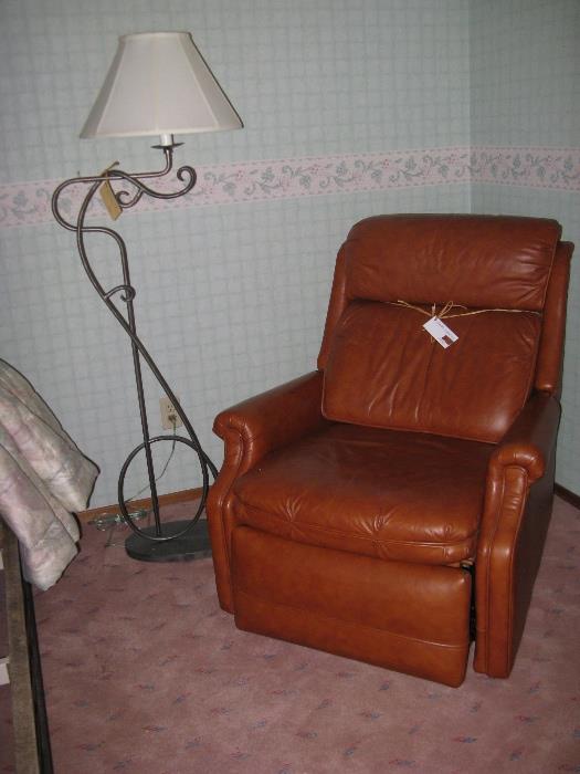 This is a very gently used recliner.  Butter-soft leather!  It can be placed against the wall and still recline.