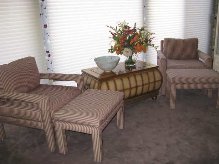 A pair of striped chairs wit ottomans.  A lovely blanket chest/coffee table.
