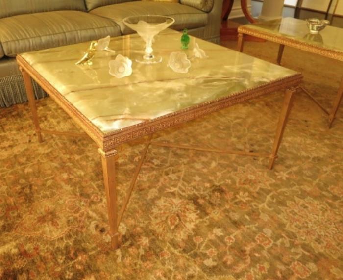Two of of three Italian Mable-top Coffee Tables inset on Gilt Bronze Bases with a selection of signed Lalique Pieces.