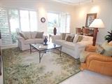 Henredon Sofa and Love Seat. Wrought iron, glass top, coffee table.
