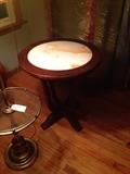Mahogany and marble end table.