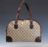 Lot7a: Group of Three Designer Hand Bags
 including Chanel, Gucci and Coach together with a Vuitton portfolio