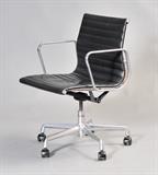 Lot#27: Eames Swivel Office Chair
 by Herman Miller with leather seat 34" high contemporary