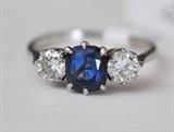 Lot#53: 14k Gold Sapphire and Diamond Ring
 the two diamonds each approx. .40 cts 2 dwt gross, ring size 7 1/2