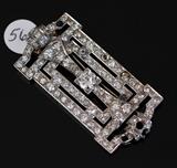 Lot#56: Platinum Art Deco Diamond Brooch
 with approximately 1 ct center stone 2 1/8" long, 9.3 dwt gross circa 1930