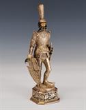 lot#61: Continental .800 Silver Figure of a Knight
 with shield in right hand and sword in his left hand 10" high late 19th century