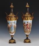 lot#62: 
Watch Lot
Pair of Sevres Urns
 with painted decoration of courting figures gilt bronze mounts each 22" high circa 1900