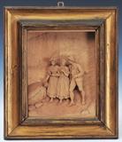 lot 73: Framed German Carved Relief
 with three figures in an Alpine landscape 9" x 7"  labeled verso Gebruder Hammerl late 19th century