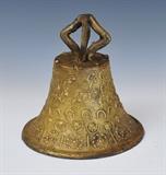 Lot 77: Spanish Colonial Bronze Bell
 embossed with scrolls, flowers and fox heads 8 1/2" high with original clapper 18th century